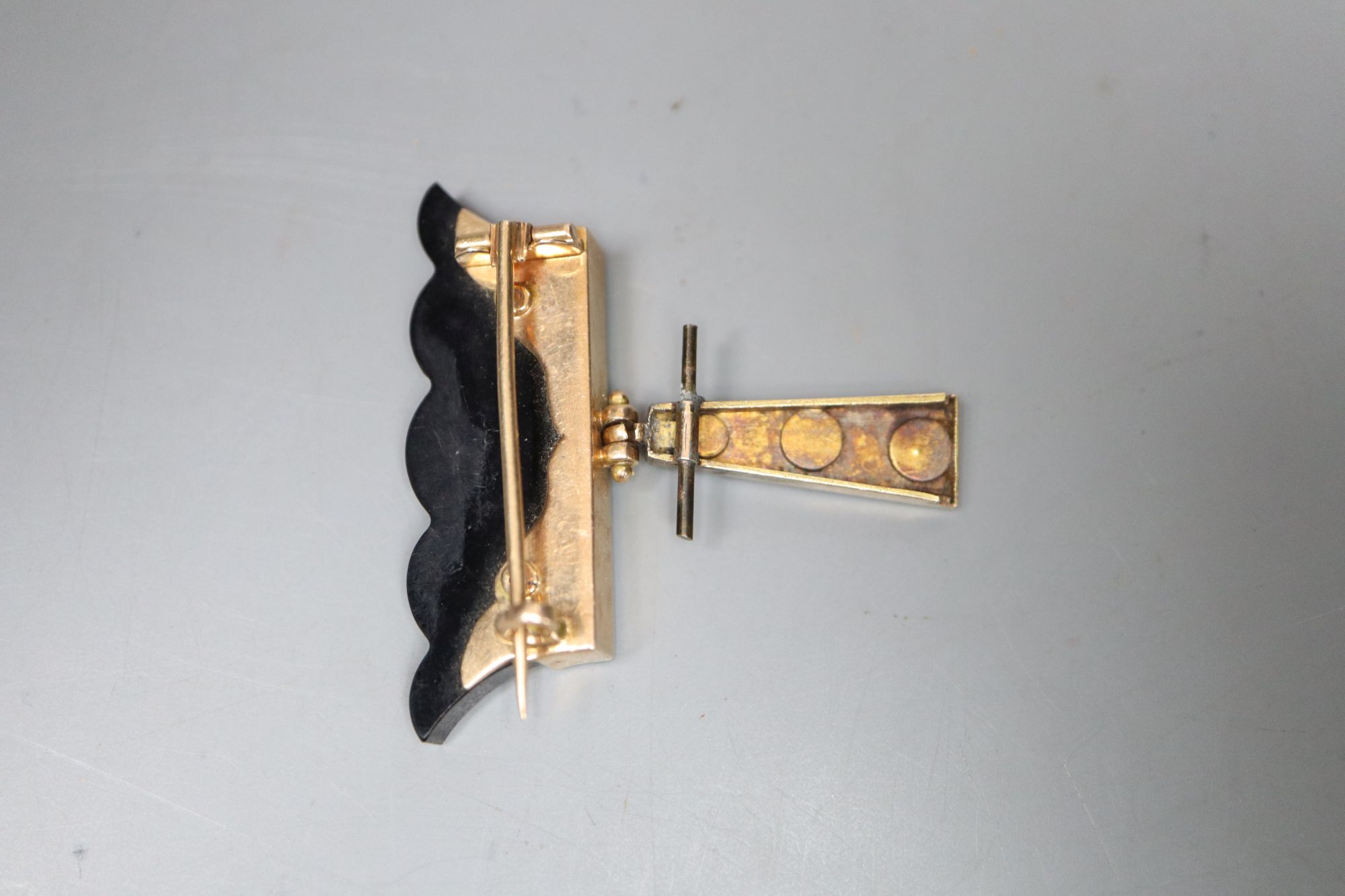 A Victorian gold, pearl and jet brooch with black enamel decoration, width 3.75cm, gross 9.8 grams